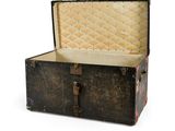 an old suitcase that is open on a white background