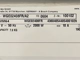 a label on the back of a microwave oven