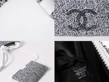 a picture of a purse that has a tag attached to it