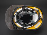 a close up of a helmet on a black background