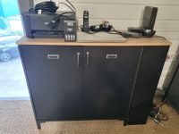 1 meuble stratifié noir à 2 vantaux, plateau en stratifié fa…