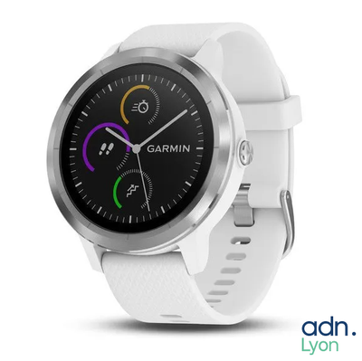 a close up of a smart watch with a white band