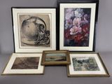 quatre photos encadrées représentant des fleurs et des fruits posés sur une table