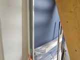 a picture of a room with a ladder and a bowl of food