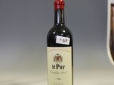 a bottle of wine that is sitting on a counter