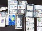 a lot of stamps and envelopes sitting on a table