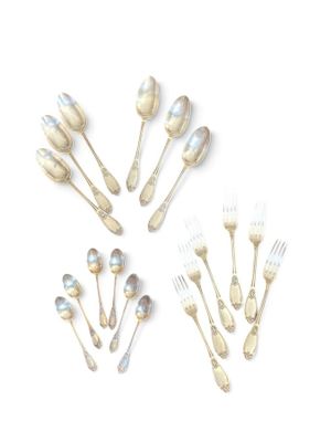 a lot of silver spoons and forks arranged in a circle