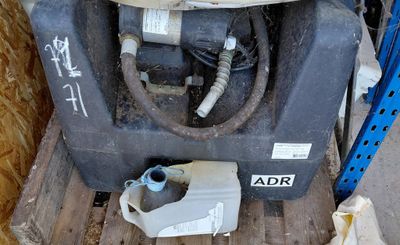 an image of a tank with a hose attached to it on a pallet