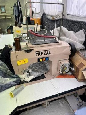 a sewing machine sitting on a table in a room