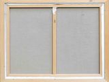a picture of a window with a screen on the outside