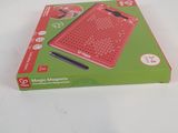a box with a red mouse on it on a white surface