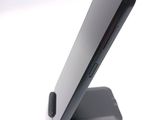 a close up of a cell phone on a stand