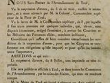 a close up of an old book with writing on it