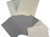 a lot of papers that are on a table