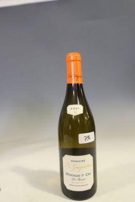 a bottle of wine that is sitting on a table