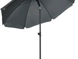 le parasol est ouvert et prêt à être utilisé sur la terrasse