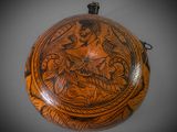 an image of a wooden bowl with a design on it