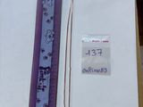 a picture of a bookmark and a ruler in a box