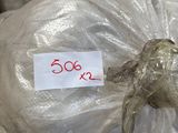 a plastic bag with a dog on it in a warehouse