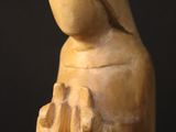 a statue of a woman holding a baby in her arms