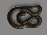 an image of a metal object with a snake on it