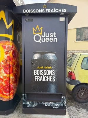 a vending machine on the side of the street