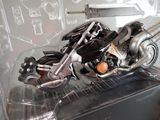 a motorcycle that is on display in a glass case