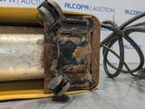 a close up of a piece of metal with wires attached to it