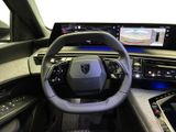 a picture of the interior of a car with a steering wheel