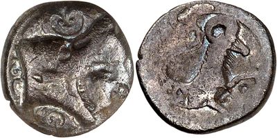 a close up of a coin with an image of a man on it