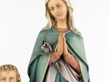 a statue of the virgin mary and a statue of the child jesus