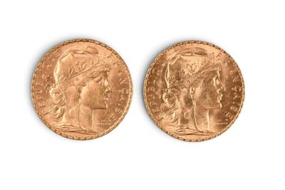 deux souverains d'or, dont l'un représente la tête d'une femme et l'autre celle d'un homme