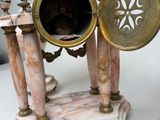 a clock that is sitting on top of a table