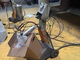 a machine that is sitting on the floor in a room