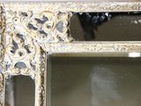 a mirror that is sitting on a table
