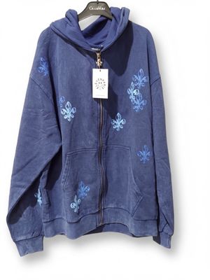 the jacket is blue and has blue flowers on it