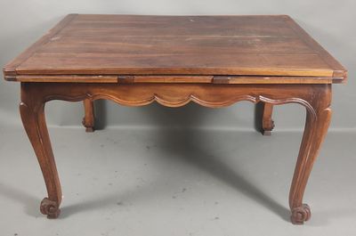 an old wooden table with a drawer on top of it