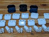 a lot of small white objects on a wooden table