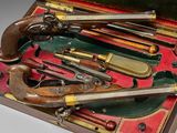 many different types of guns in a case