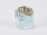 a piece of ice that has some kind of rock inside of it