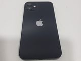 an apple iphone sitting on top of a white table next to a cup of coffee
