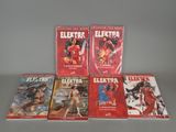 the complete set of elektrix comics is on display
