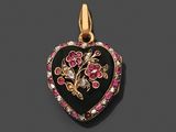 un pendentif en forme de cœur en émail noir, orné de pierres roses et blanches