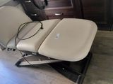 a chair that is sitting on a table in a room