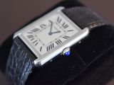 an image of a wrist watch with roman numerals on it