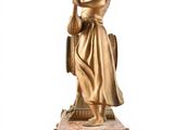statue of a woman holding a basket of flowers on a marble base