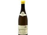 a bottle of wine that is sitting on a table