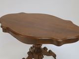 an image of a small table with a wooden top