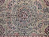 an image of a rug with a floral design on it