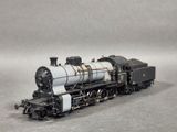 a toy train that is sitting on the tracks